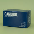 Candido 800 35mm color negative film on a green background