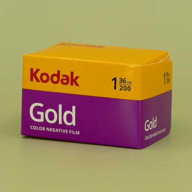 Kodak Gold 36exp color negative film box on a green background