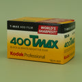 Kodak 400 Tmax black and white 35mm film box on a green background